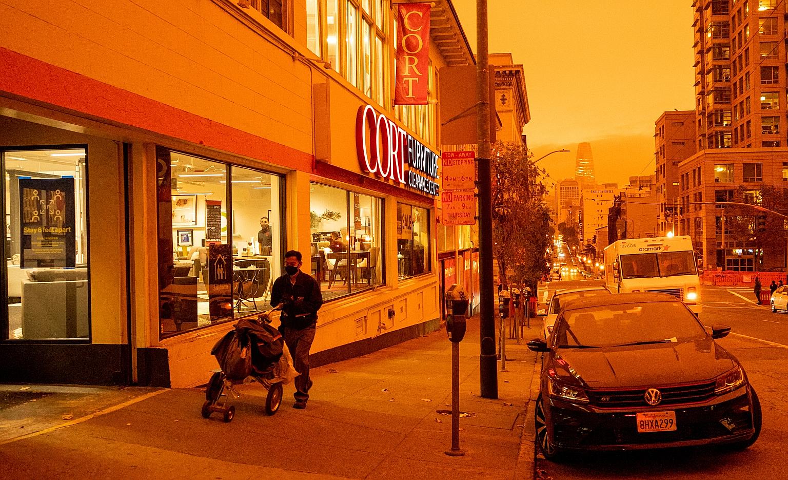 An orange haze blanketed San Francisco in California on Wednesday. Air quality officials said in a tweet that the orange skies were a result of wildfire smoke in the air, as smoke particles allowed only yellow, orange and red light to reach the surfa