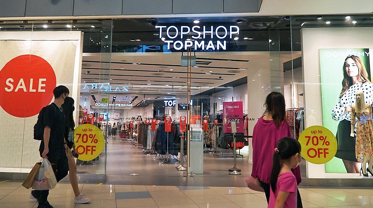 The Topshop and Topman outlet at VivoCity (above) will be closing for good next Thursday. Wing Tai Retail, brand manager for the two brands here, said its focus for them will be online. ST PHOTO: KHALID BABA