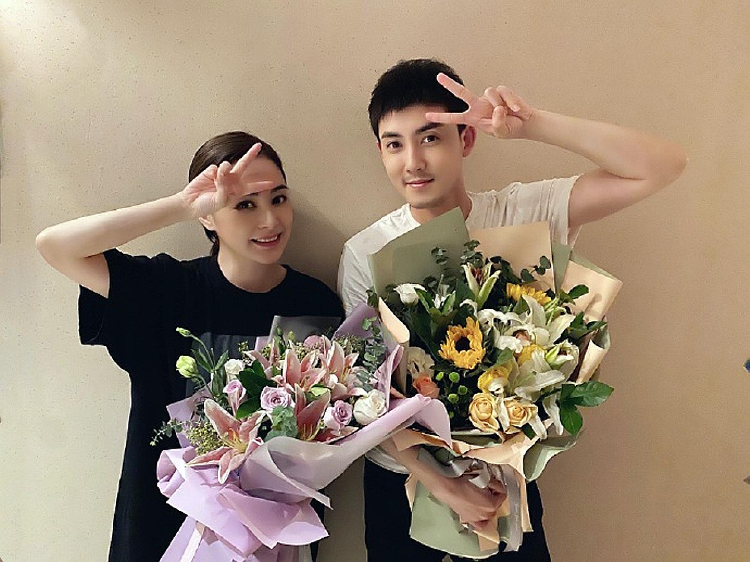 GILLIAN CHUNG IS BACK AT WORK: Less than a week after her head injury, Hong Kong star Gillian Chung has quietly returned to work. Last Saturday, Chinese actor Ray Zhang's agency posted two photos of the two of them together, holding a bouquet of flow