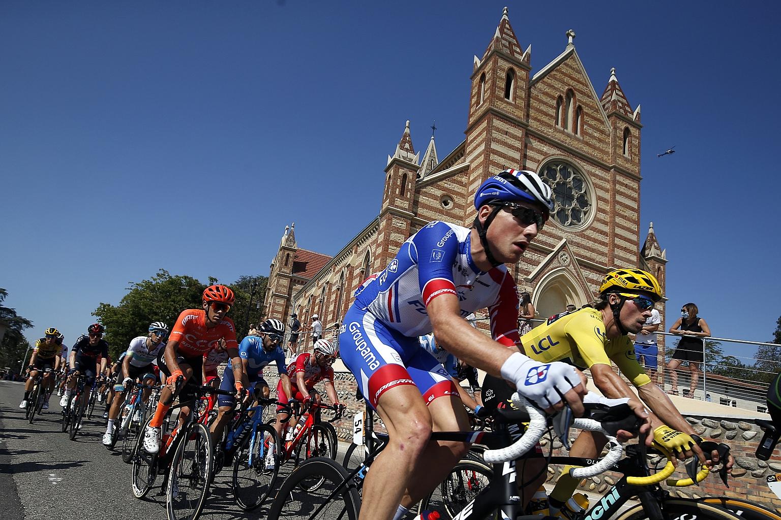 NTT's new race centre website offers cycling enthusiasts a more in-depth look at Tour de France cyclists such as overall leader Primoz Roglic (right) of Jumbo-Visma. PHOTO: EPA-EFE