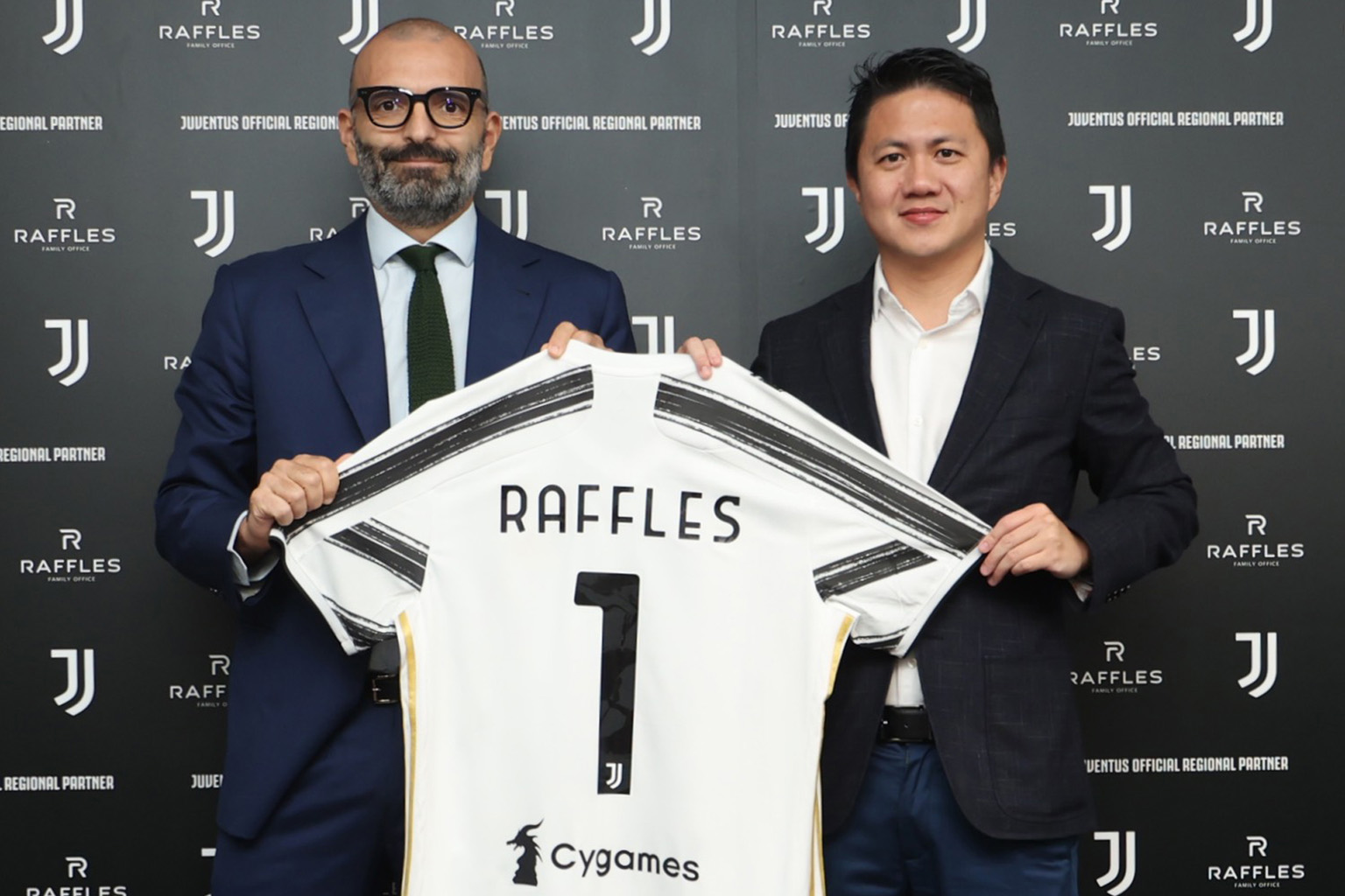 Juventus Asia-Pacific managing director Federico Palomba and Raffles Family Office founder Kwan Chi Man posing with the club shirt to commemorate the three-year partnership. PHOTO: RAFFLES FAMILY OFFICE