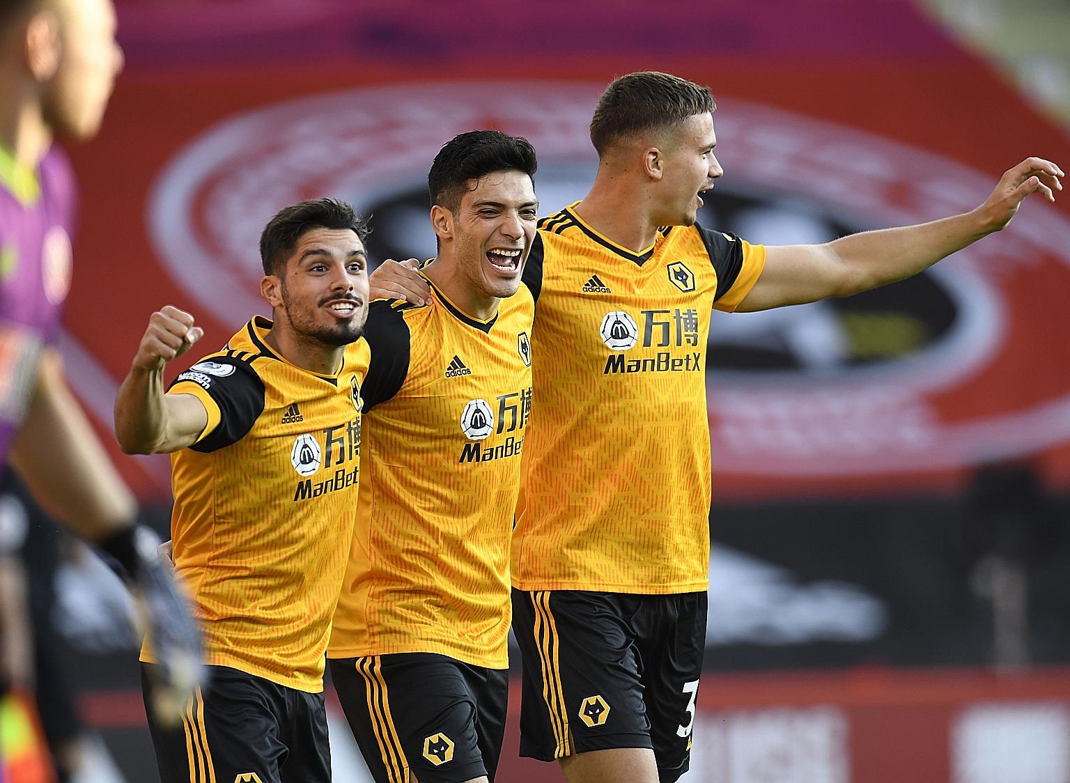 Raul Jimenez (centre) celebrating his opener with teammates. The Mexico striker was Wolves' top scorer in the top flight last season with 17 goals. PHOTO: EPA-EFE