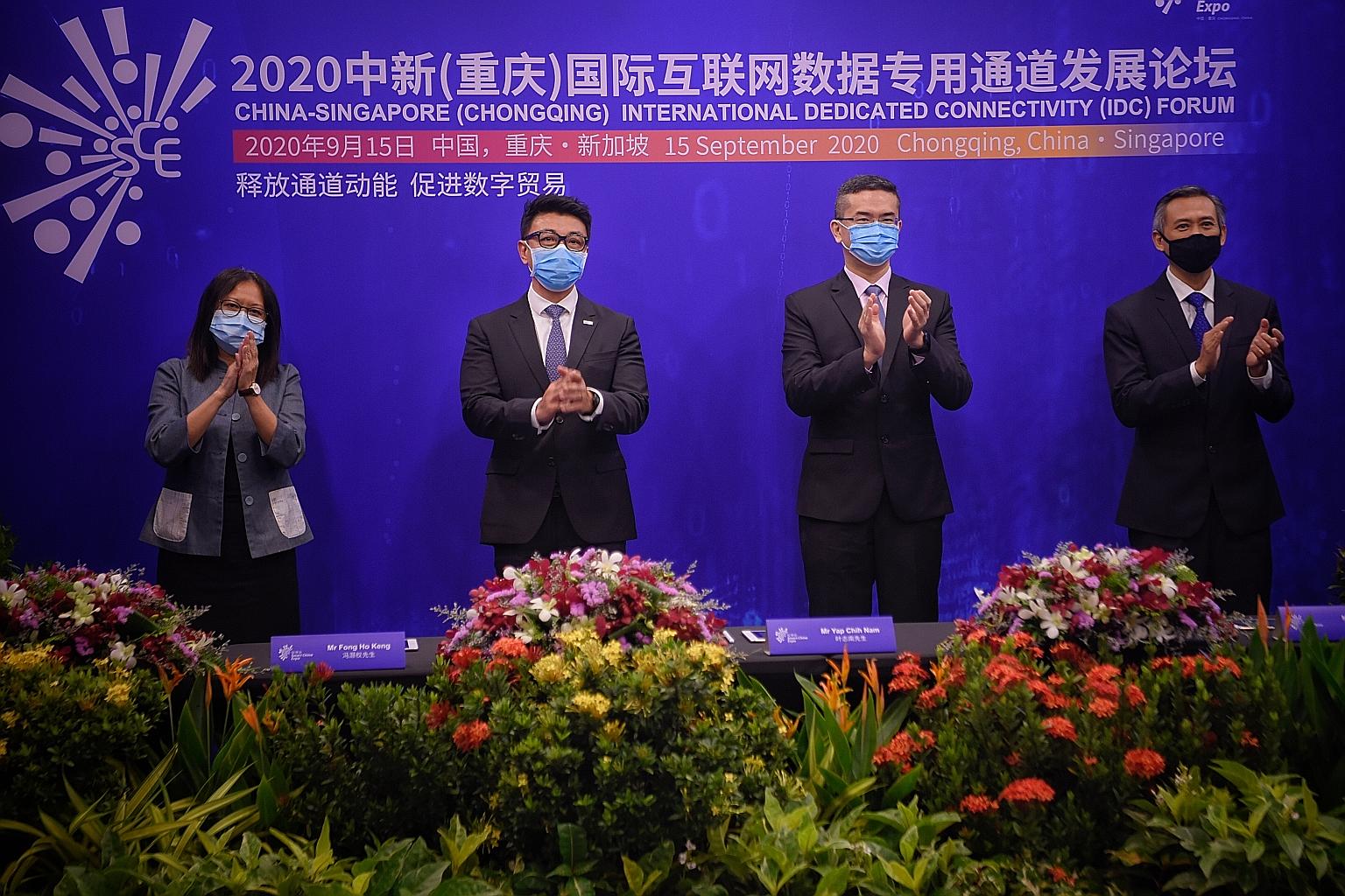 (From left) Infocomm Media Development Authority (IMDA) director of international platforms and partnerships Samantha Fok, SGTech chairman Wong Wai Meng, IMDA chief executive Lew Chuen Hong and IMDA assistant chief executive of technology and infrast