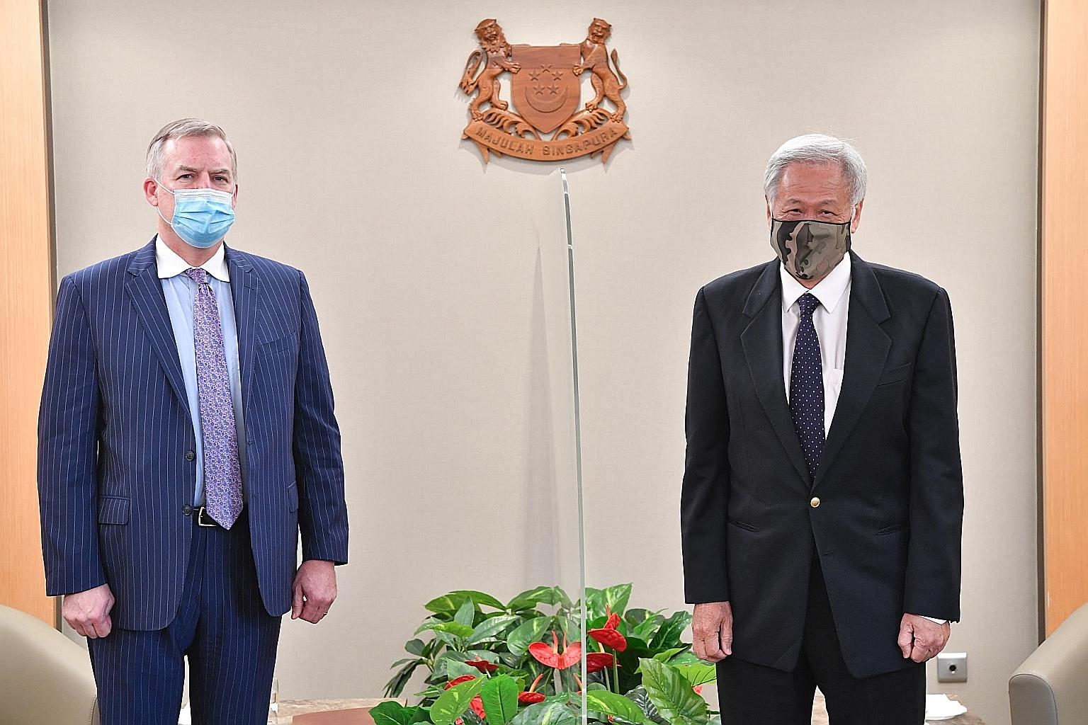 US Acting Undersecretary of Defence for Policy James Anderson calling on Defence Minister Ng Eng Hen at Mindef yesterday. Dr Anderson also visited RSS Singapura-Changi Naval Base and Sembawang Air Base. PHOTO: MINDEF