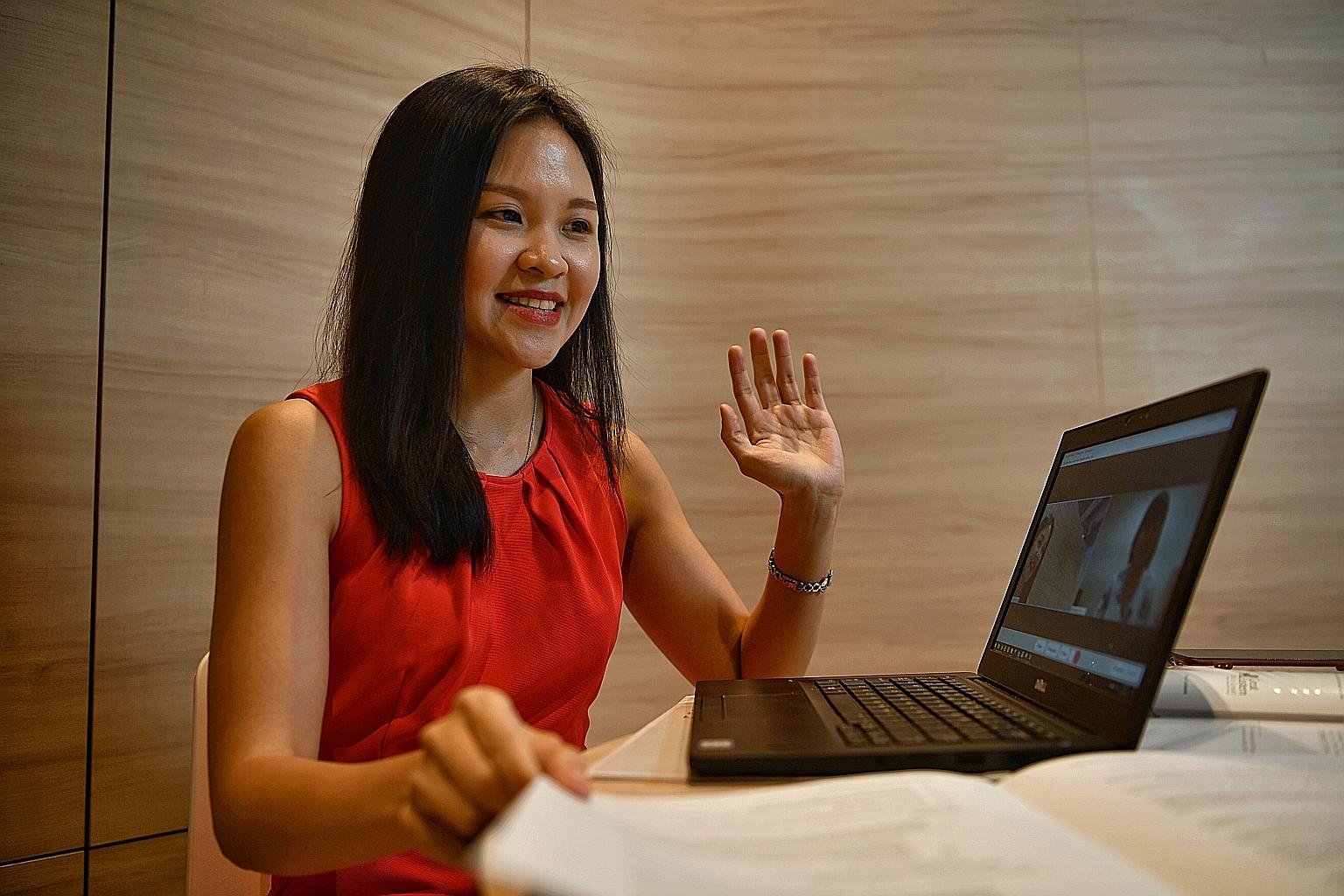 A Great Eastern employee showing how it conducts interviews online. Potential financial representatives must still pass a test and be licensed through the Monetary Authority of Singapore before they are hired.