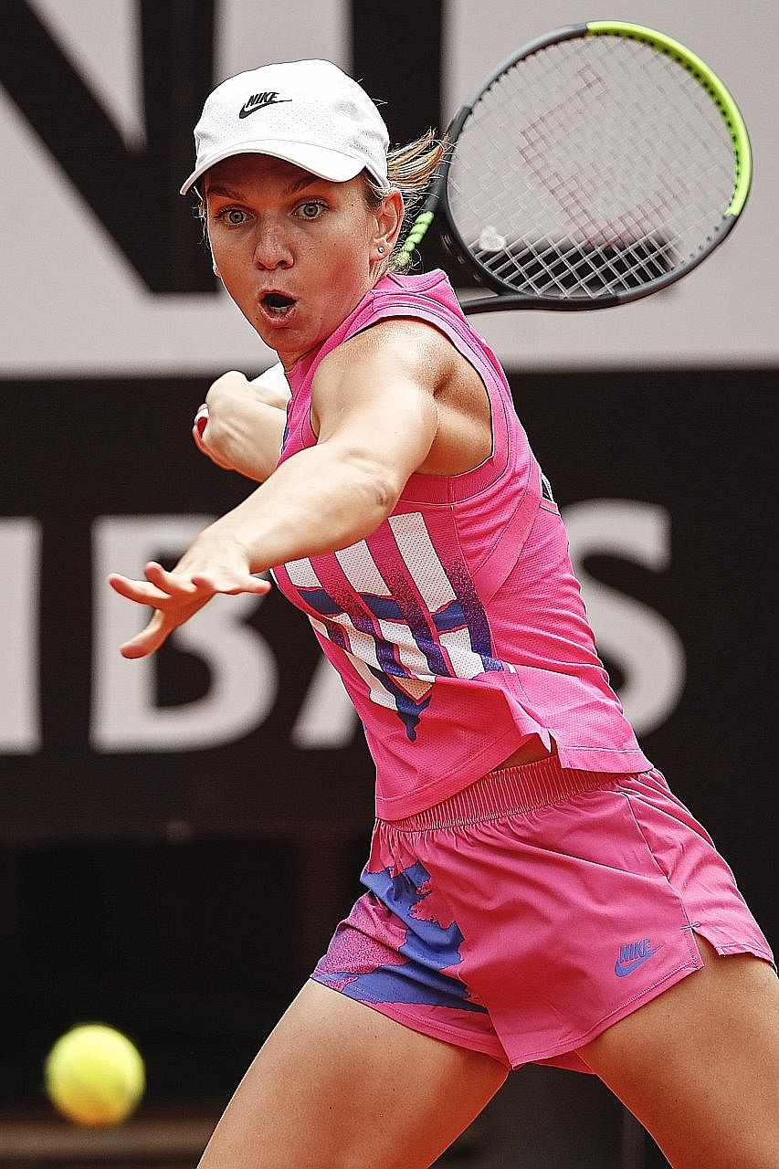 Simona Halep hitting a forehand against Karolina Pliskova in the Italian Open yesterday. The final lasted 31 minutes.