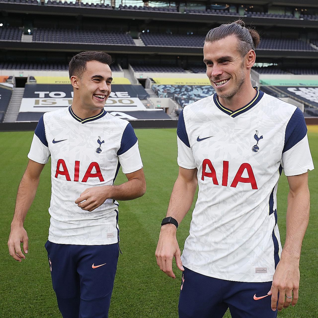 Gareth Bale and fellow new signing Sergio Reguilon, also from Real Madrid, enjoying a chuckle at their Tottenham unveiling. PHOTO: TWITTER/SPURSOFFICIAL