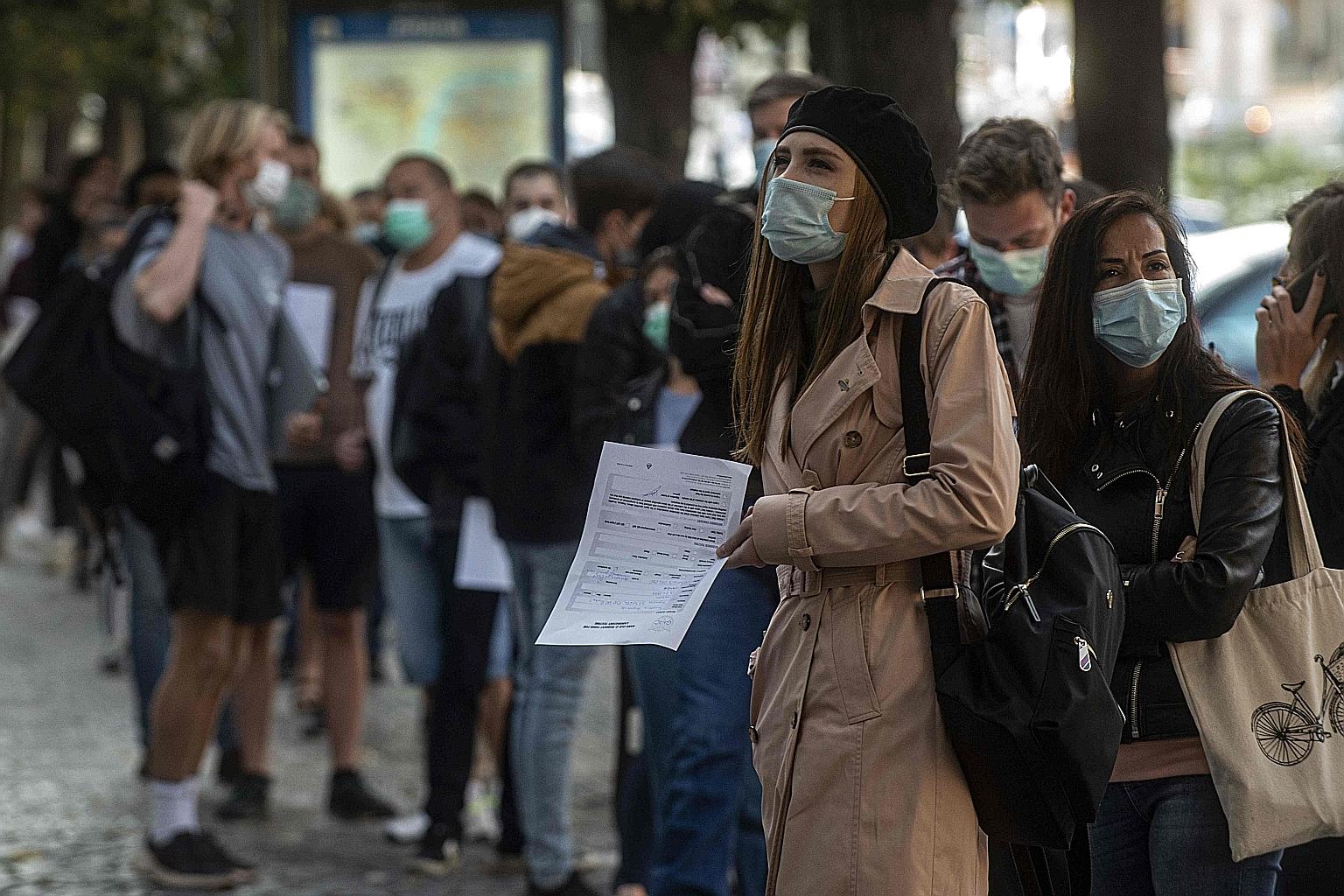 People waiting in line for Covid-19 testing in Prague on Monday. The Czech Republic's spike in cases has been the second fastest in Europe on a rolling two-week basis after Spain when adjusted for population.