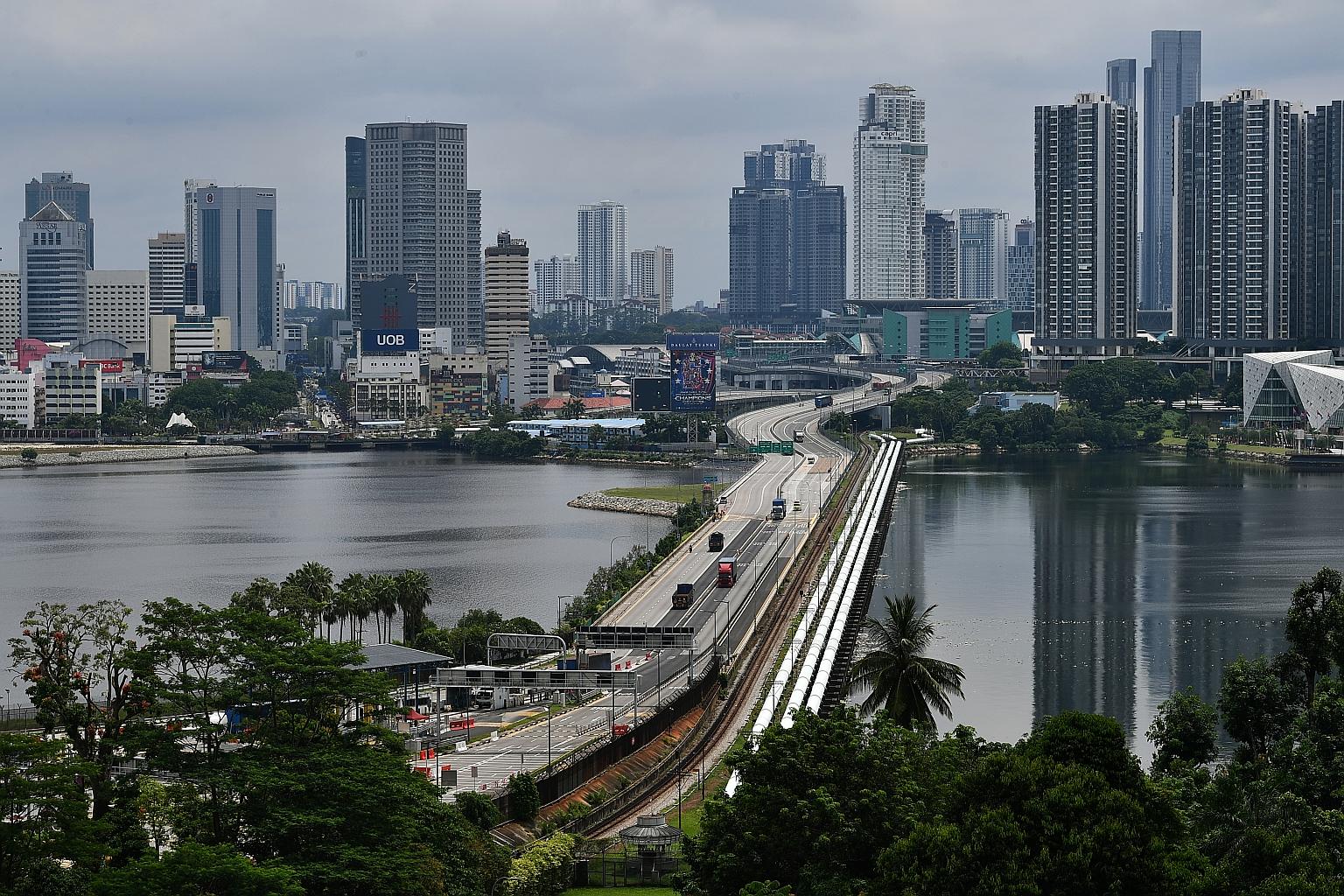 An almost empty Causeway on May 6. All foreign-registered vehicle permits will have to be extended every two weeks, as was the case before the rule was waived in March. ST PHOTO: LIM YAOHUI