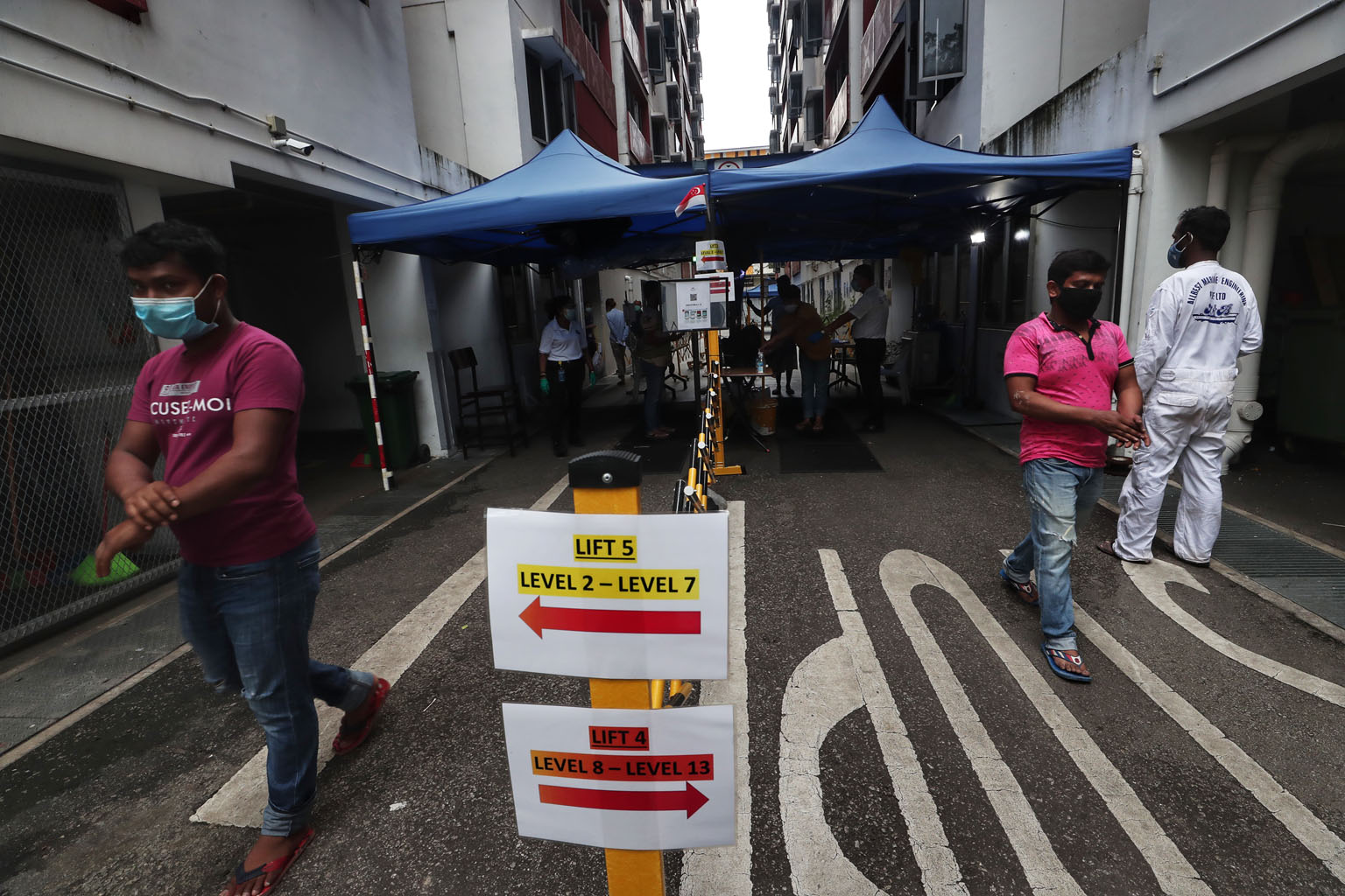 At Westlite Woodlands dormitory, measures to prevent intermingling include having dedicated lifts, staircases, entrances and exits for each section. Such safe living measures allow a smaller group of residents to be quarantined if one of them tests p
