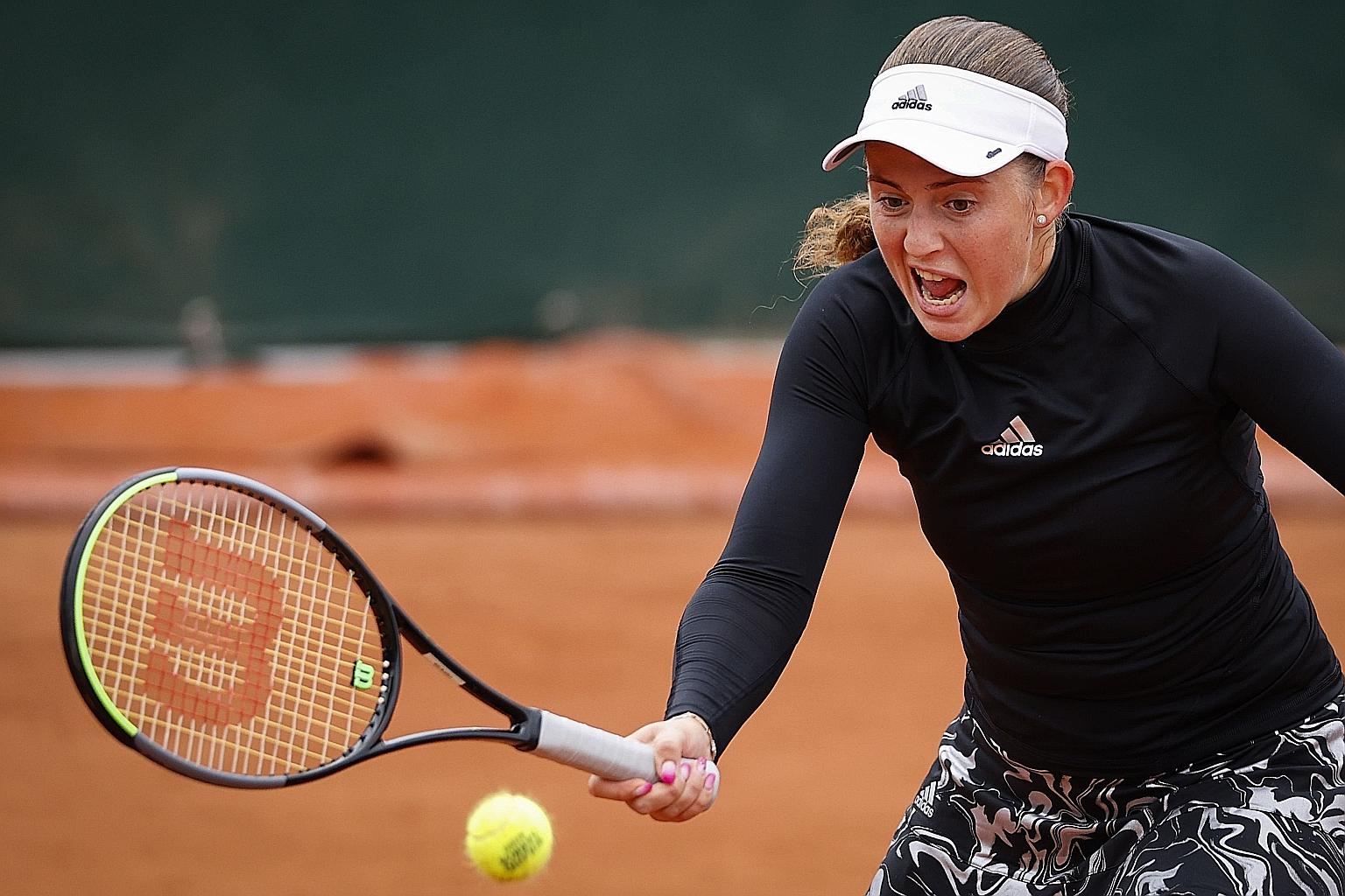 Latvia's Jelena Ostapenko going for broke against Madison Brengle in their first-round clash at Roland Garros yesterday. She hit 46 winners but committed 37 unforced errors. PHOTO: AGENCE FRANCE-PRESSE