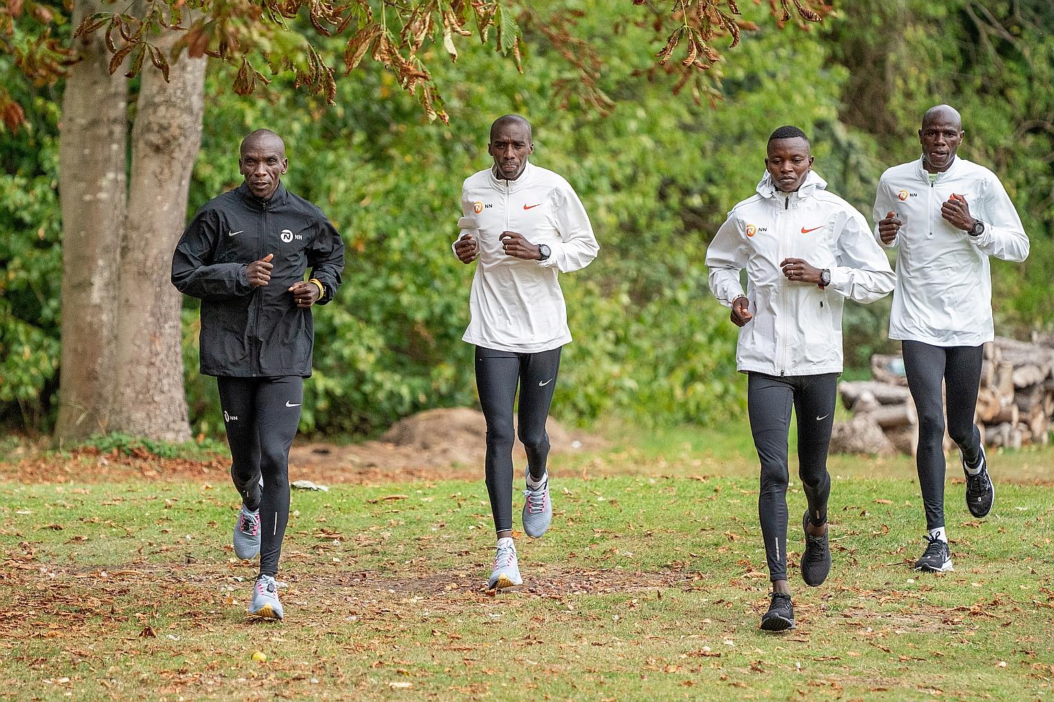 Kenya's Eliud Kipchoge (in black) training alongside his pacemakers for Sunday's London Marathon. The closed-door event will be restricted to only 100 elite-level competitors, including long-time rival, Ethiopia's Kenenisa Bekele. PHOTO: EPA-EFE