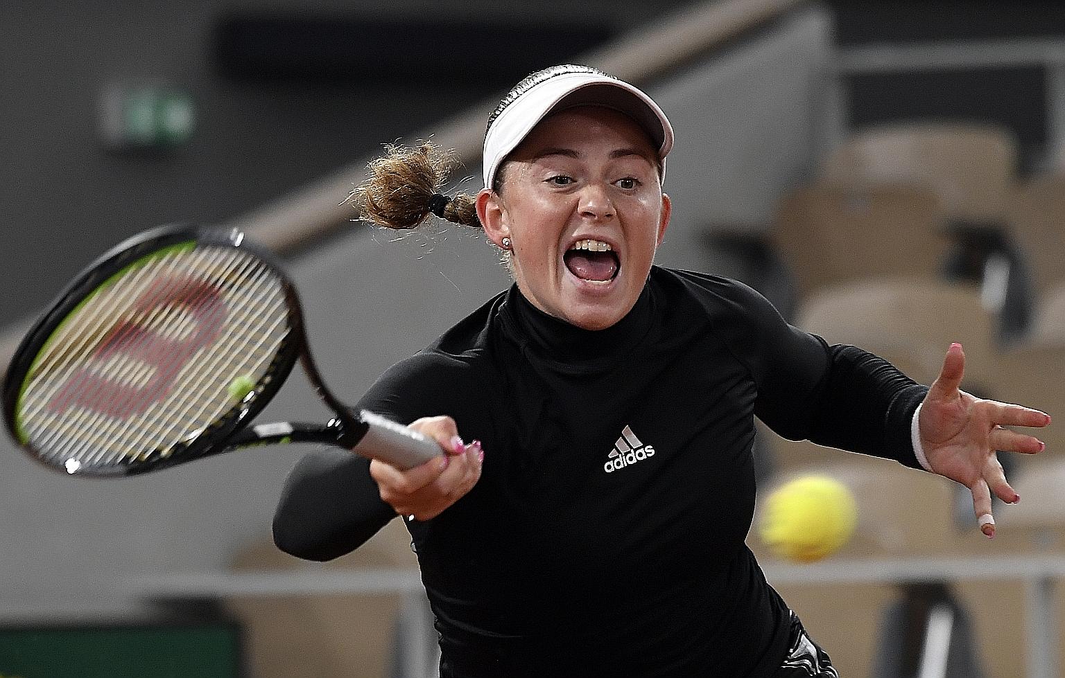 Jelena Ostapenko returning against Karolina Pliskova. The Latvian shocked the second-seeded Czech yesterday, rekindling memories of her only Major triumph three years ago. PHOTO: EPA-EFE