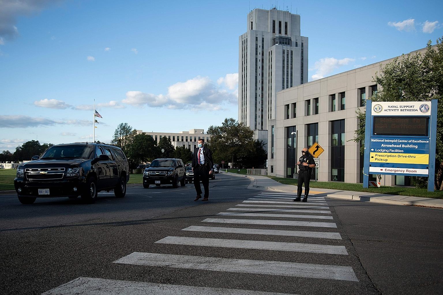 US President Donald Trump's motorcade arriving on Friday at Walter Reed National Military Medical Centre in Maryland. PHOTO: AGENCE FRANCE-PRESSE