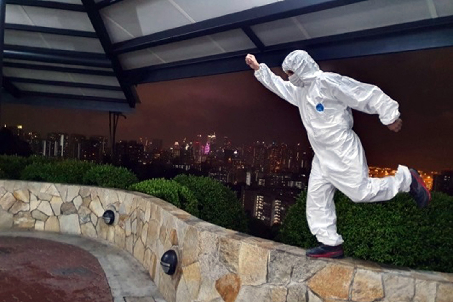 Mr Michael Astronomo, a participant in the Singtel-Singapore Cancer Society Race Against Cancer 2020, was at Mount Faber on Sept 26 to run part of his 33km route. He was in personal protective gear not to guard against the coronavirus, but the rain a