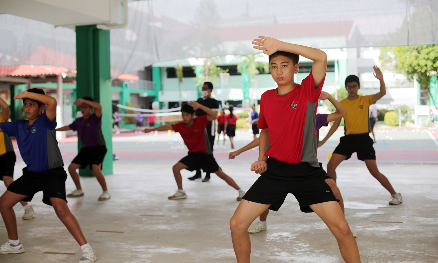 Secondary 2 students from Chua Chu Kang Secondary School during a wushu session in August. The 1m distance between students will still apply when more school and co-curricular activities resume. When they practise sports while unmasked, they should s
