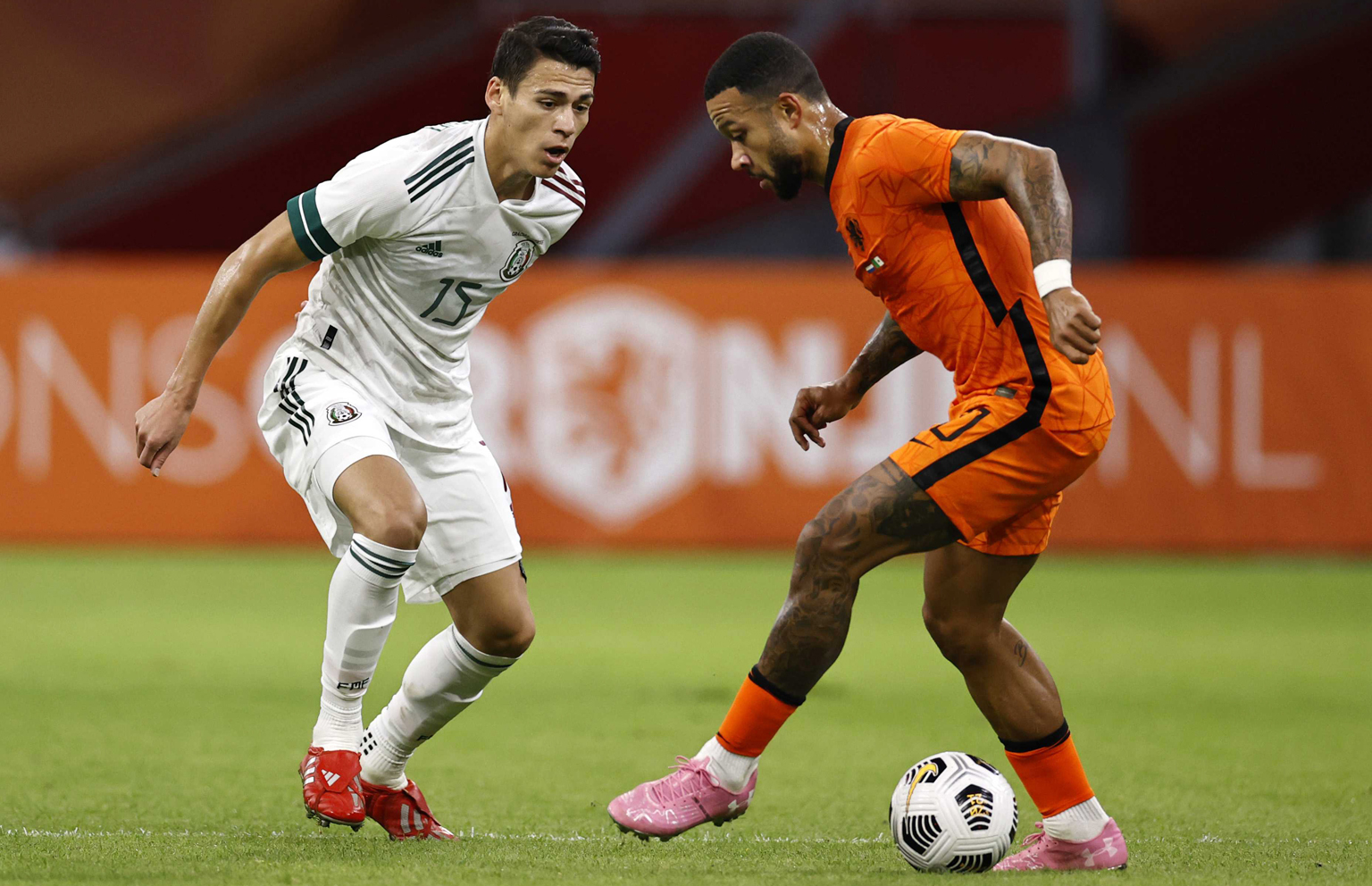 Netherlands forward Memphis Depay taking on Mexico defender Hector Moreno on Wednesday. The 1-0 friendly defeat at home will be a concern for new coach Frank de Boer as many fans and critics are not convinced he is the right man for the job ahead of 
