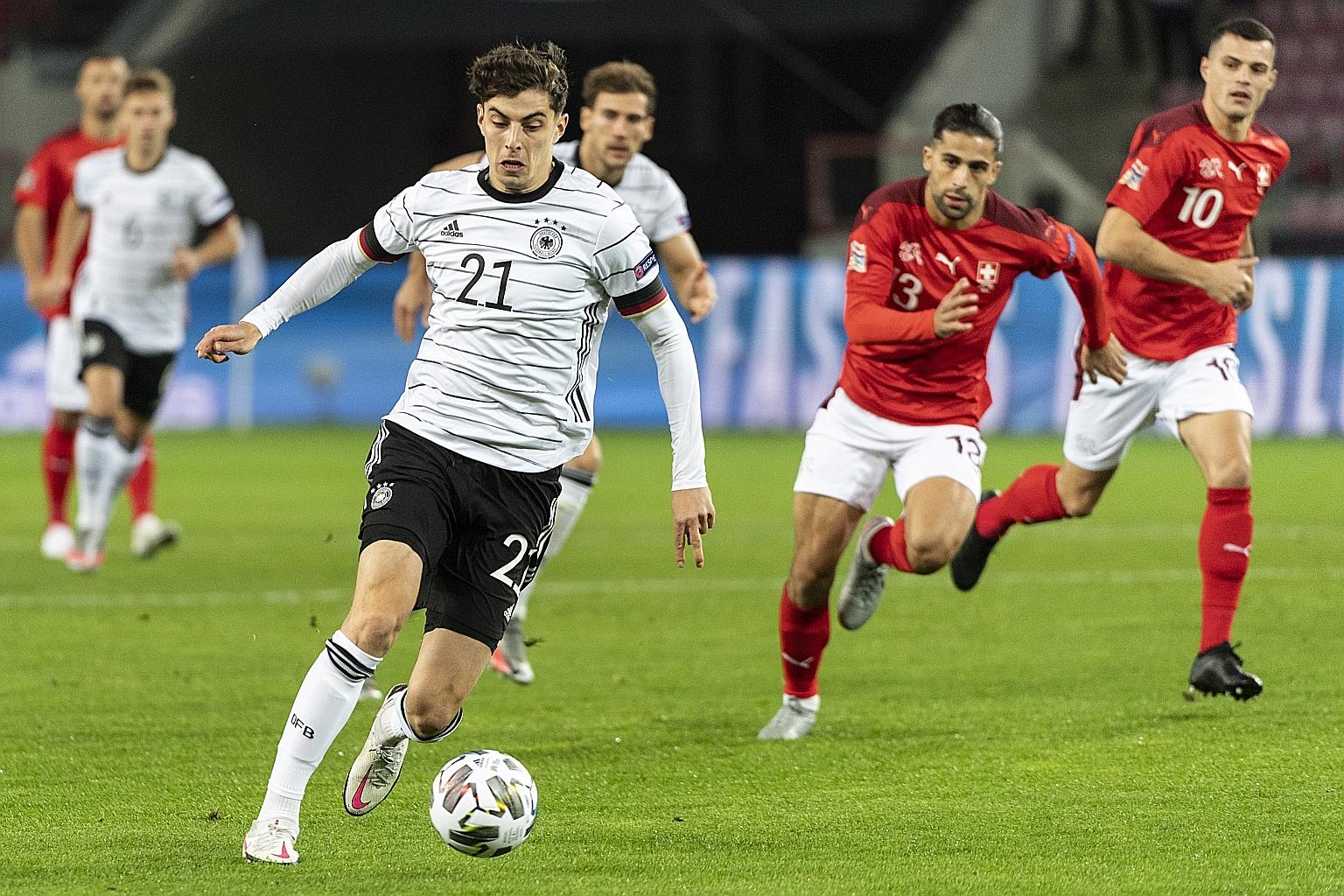 Kai Havertz on the ball against Switzerland in Cologne. Weak defensively in recent games, Germany had to fight back to draw 3-3.