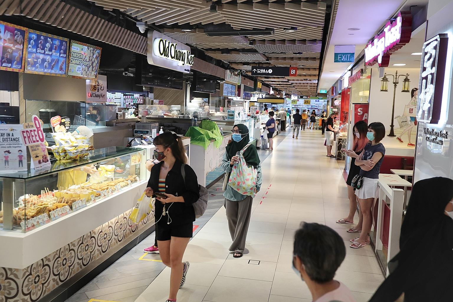 Singapore Press Holdings' property business - which includes retail properties such as The Clementi Mall (above) - posted a better showing than the company's media segment, rising 10.3 per cent to $327.2 million. But the loss before tax was $75.8 mil