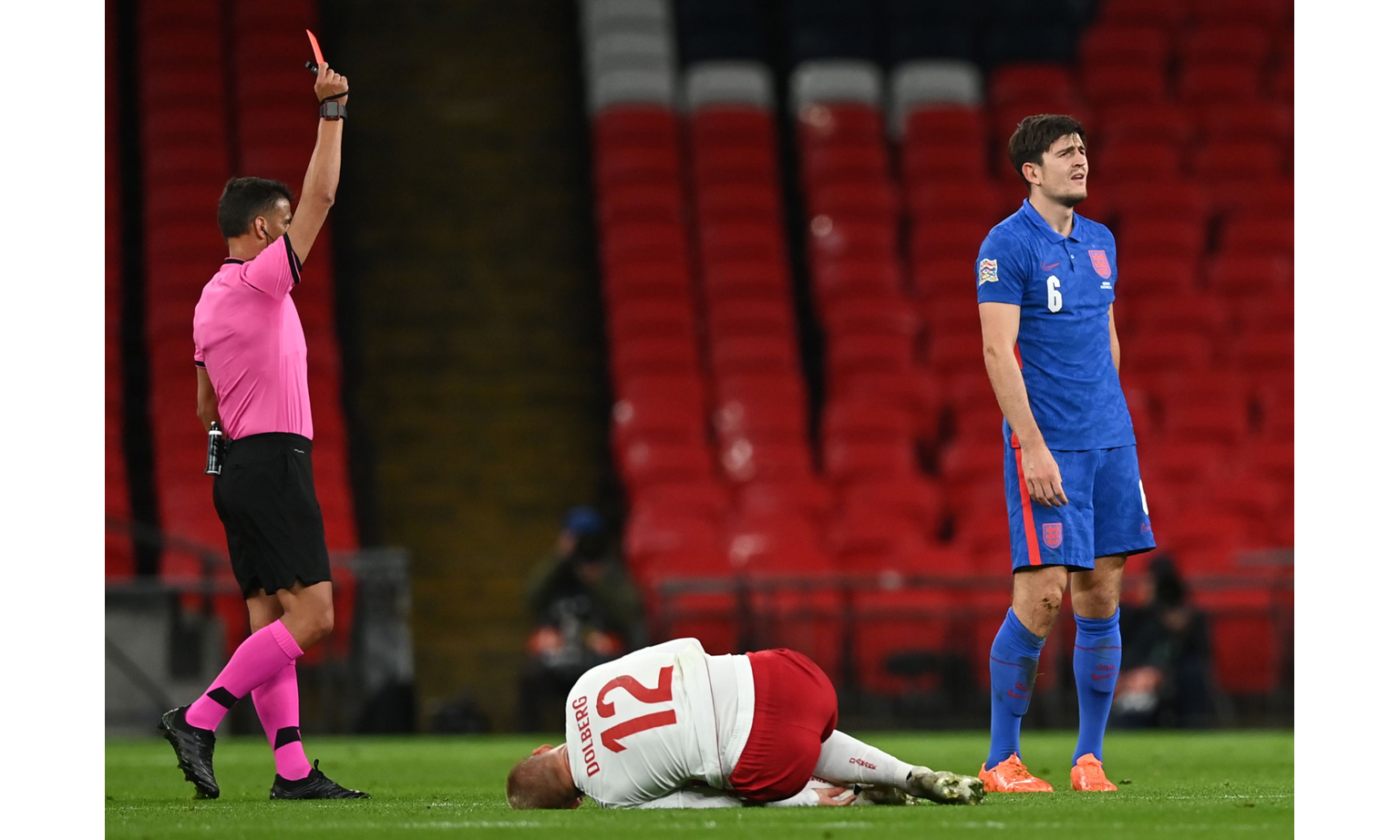England defender Harry Maguire receiving his marching orders at Wembley for a second bookable offence. He was also made the scapegoat for Manchester United's 6-1 trouncing by Tottenham on Oct 4.
