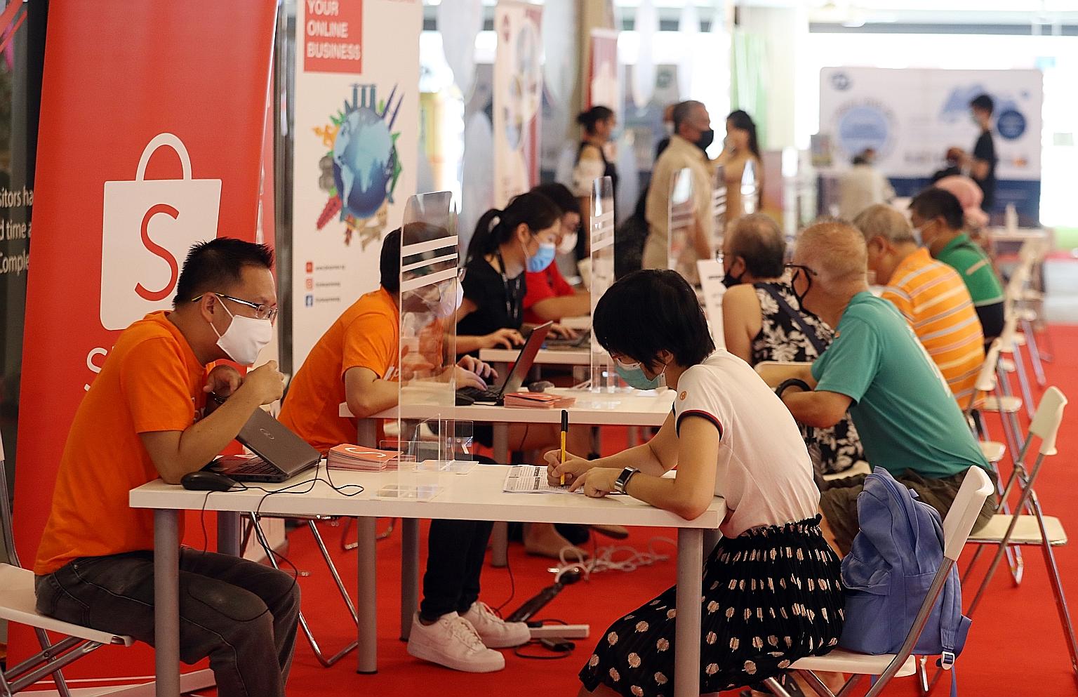 Out of the 1,400 jobs on offer at the career fair in Our Tampines Hub, 280 were for professional, manager, executive and technician (PMET) roles. Other forms of support for job seekers were available from social agencies and organisations which also 