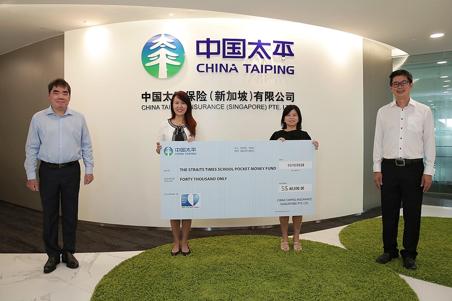 The Straits Times School Pocket Money Fund's general manager Tan Bee Heong (third from far left) with (from far left) China Taiping Insurance (Singapore)'s chief marketing officer Andrew Lee, deputy general manager Lynn Lee and business partner Nicho