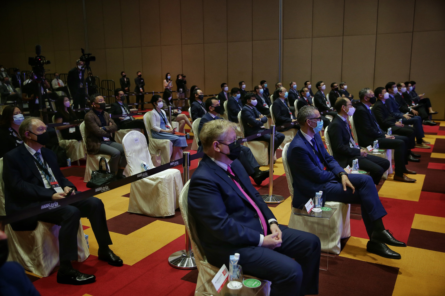 Attendees practising safe distancing during the Industrial Transformation Asia-Pacific opening ceremony at Singapore Expo & Max Atria yesterday. The event, which has gone hybrid for the first time, is the first in-person Mice event held at Singapore