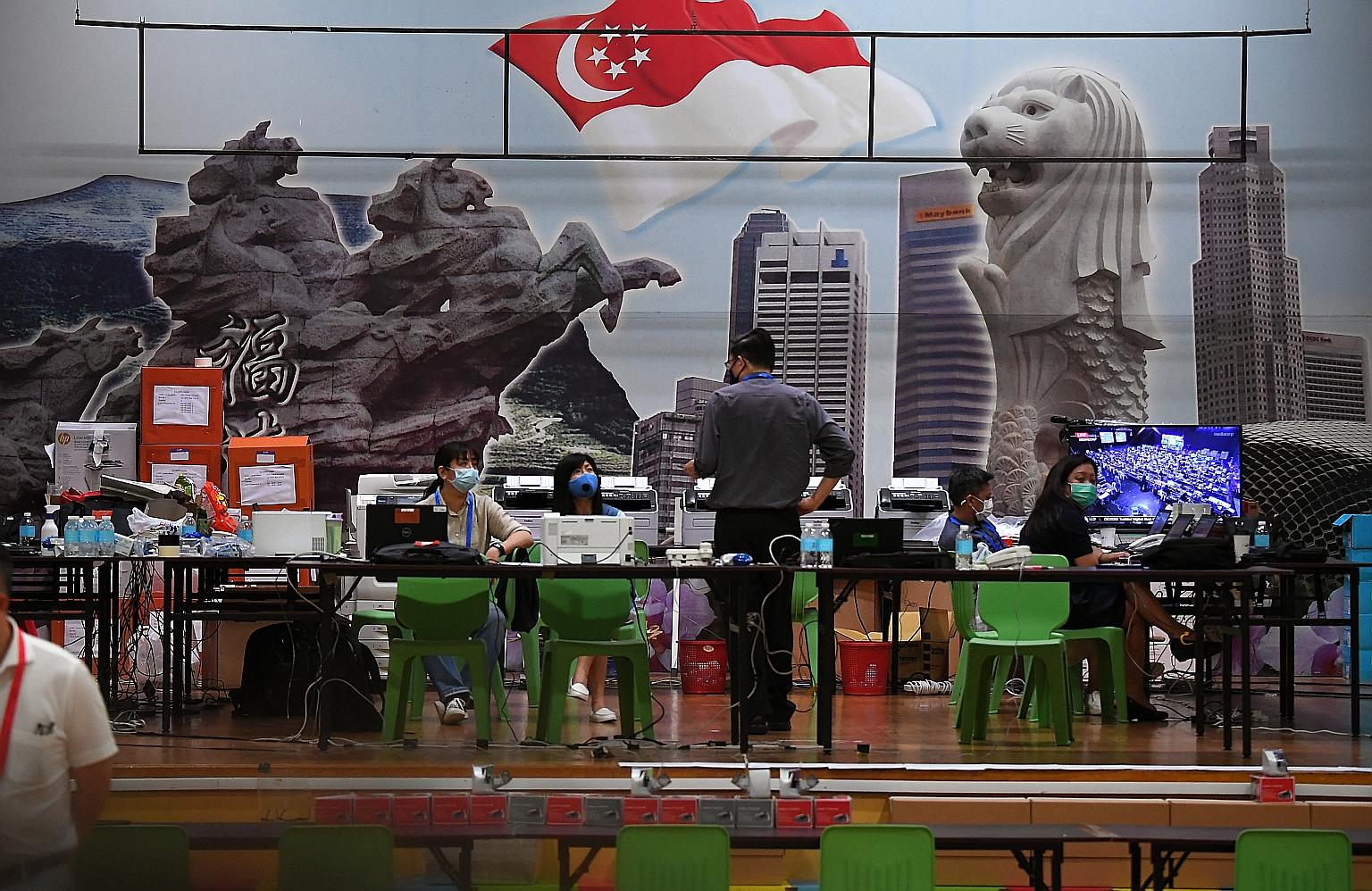The dialogue's panellists were (clockwise from top right) Parliamentary Secretary for Health Rahayu Mahzam, Progress Singapore Party assistant secretary-general Francis Yuen, and Workers' Party member and Sengkang GRC MP Louis Chua. It was moderated 