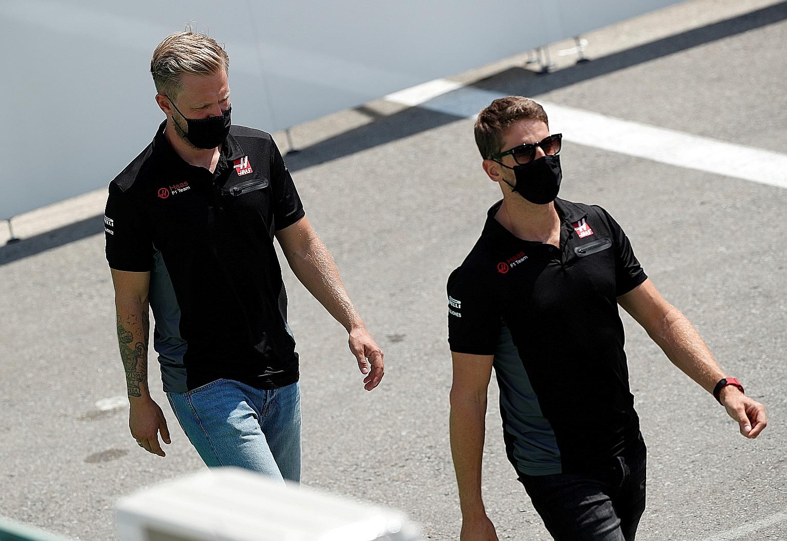 Haas' Kevin Magnussen and Romain Grosjean before the Spanish race in August. They will leave at the season's end. PHOTO: REUTERS