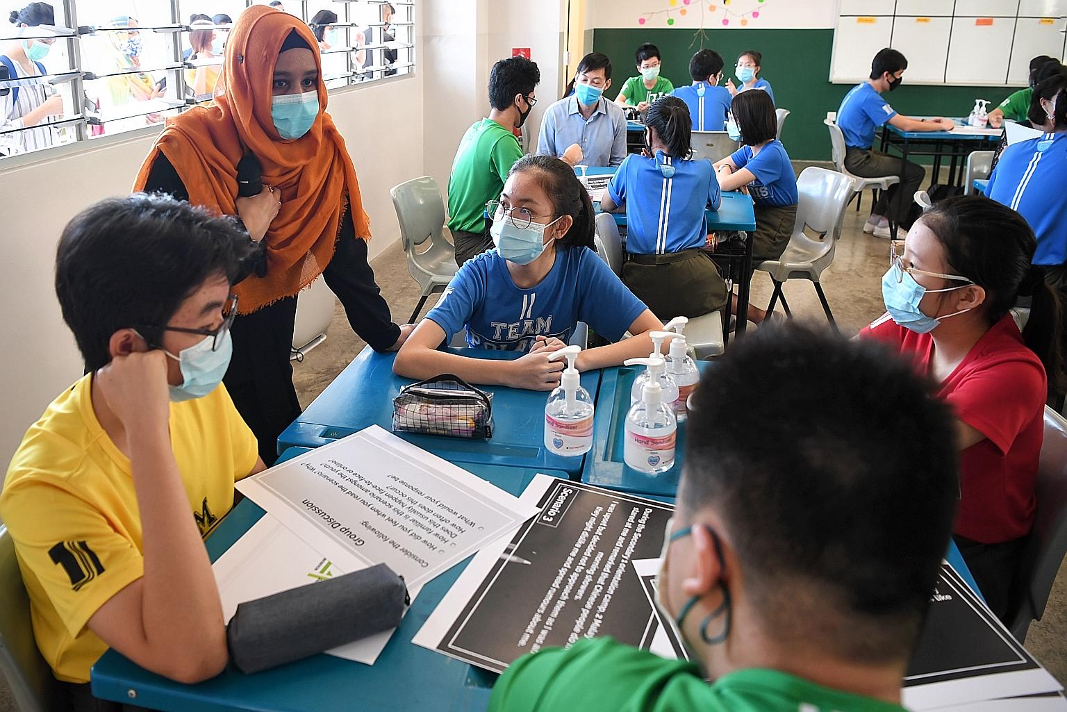 Secondary 3 students in a character and citizenship education class in Tampines Secondary School in July. The Education Ministry said Singapore's language policies and programmes contributed to the nurturing of global competency knowledge, skills and