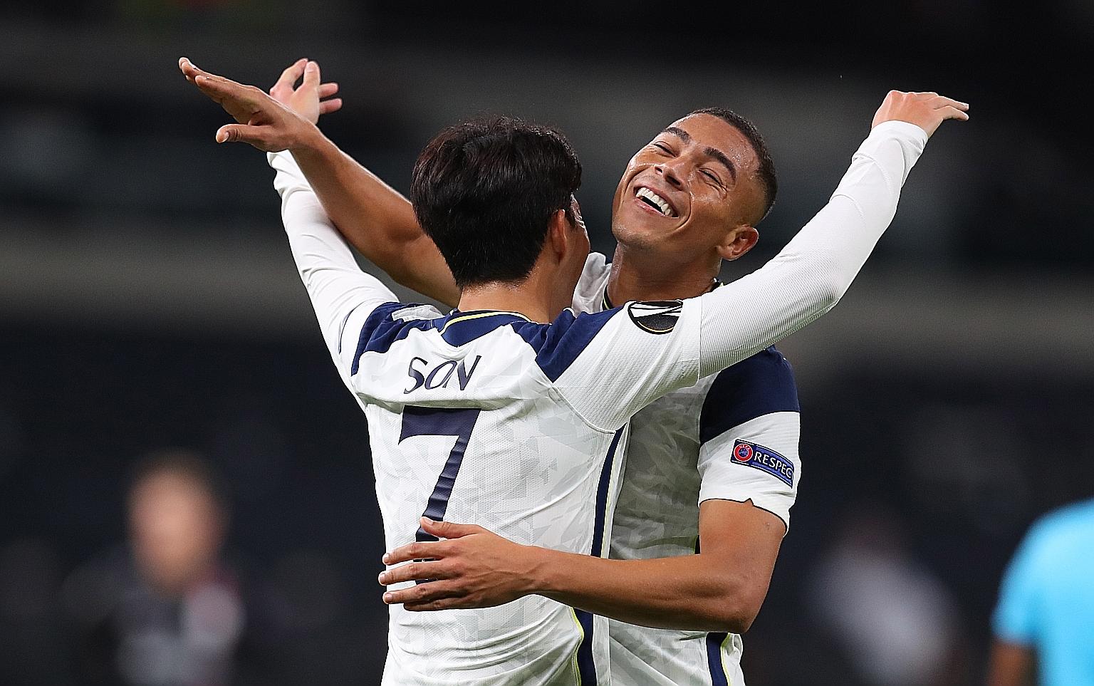 Tottenham's South Korean forward Son Heung-min celebrating with Spurs new boy Carlos Vinicius after scoring the third goal in the 3-0 Europa League win over Lask. The Brazilian had two assists on his debut.