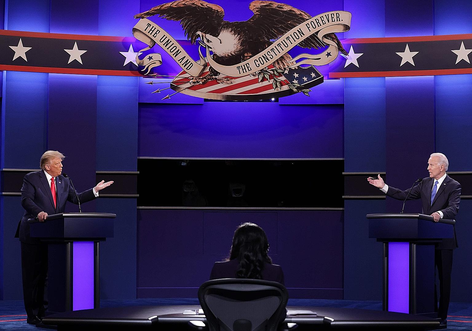 United States President Donald Trump, Democratic presidential candidate Joe Biden and moderator, NBC News anchor Kristen Welker, at the debate at Belmont University in Nashville, Tennessee, on Thursday.