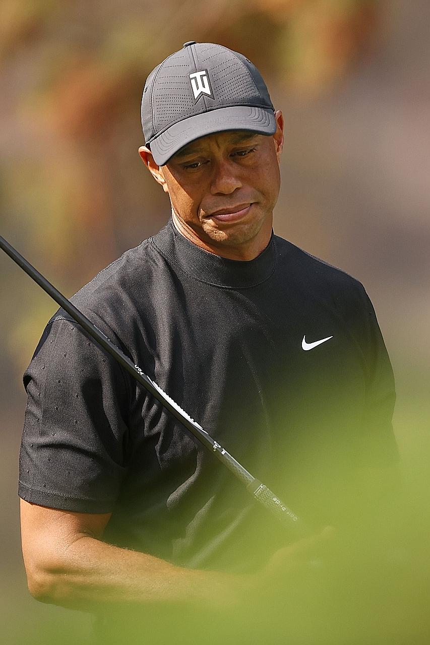Tiger Woods showing his disappointment after his shot from the 13th tee during the first round of the Zozo Championship on Thursday. He carded a double-bogey seven there on his way to a four-over 76.