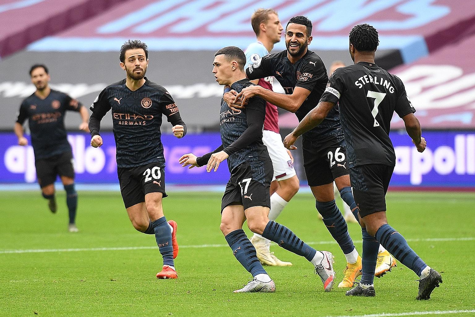 Phil Foden is congratulated by his Manchester City teammates after his equaliser in yesterday's draw at West Ham. Pep Guardiola's men could not deliver the knockout blow though and have now won just one of their last four league games.