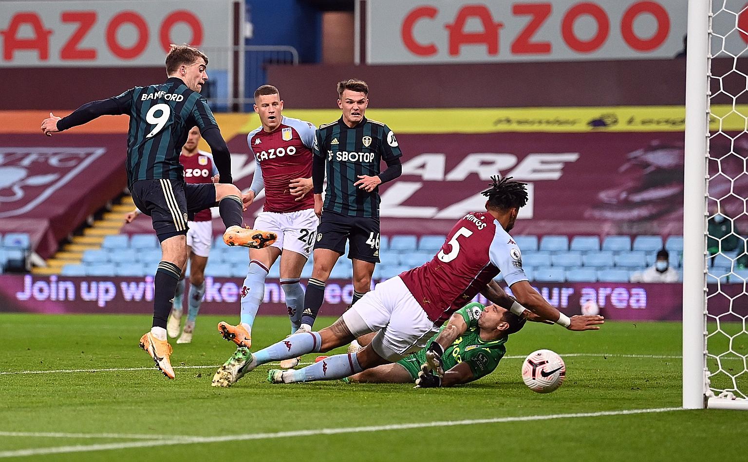 Patrick Bamford giving Leeds the lead against Aston Villa at Villa Park on Friday. The 27-year-old striker scored another two more, claiming his hat-trick in 19 second-half minutes. The 3-0 win ended the hosts' perfect record in the Premier League.
