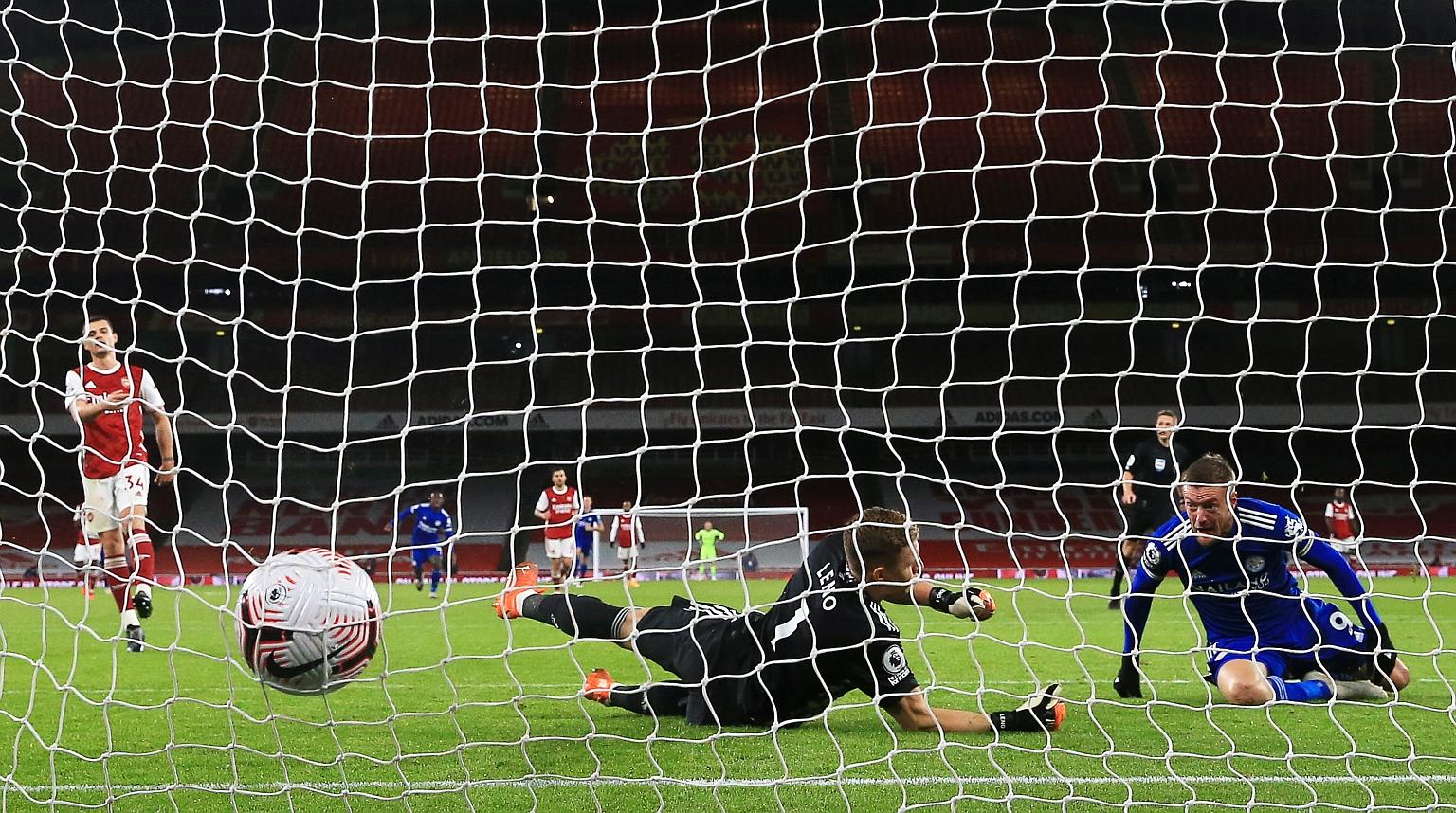 Leicester striker Jamie Vardy scoring past Arsenal goalkeeper Bernd Leno in the 1-0 Premier League victory in London on Sunday. The Foxes are now fourth in the standings. PHOTO: EPA-EFE