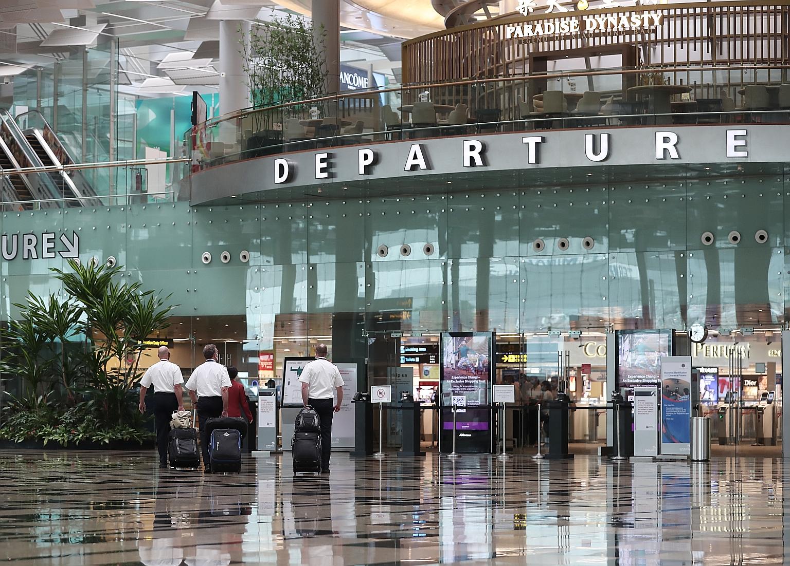 Wearing face masks properly and maintaining good hygiene will greatly reduce the risk of transmission of Covid-19 on a flight, said Professor Teo Yik Ying, dean of the NUS Saw Swee Hock School of Public Health. ST PHOTO: KELVIN CHNG