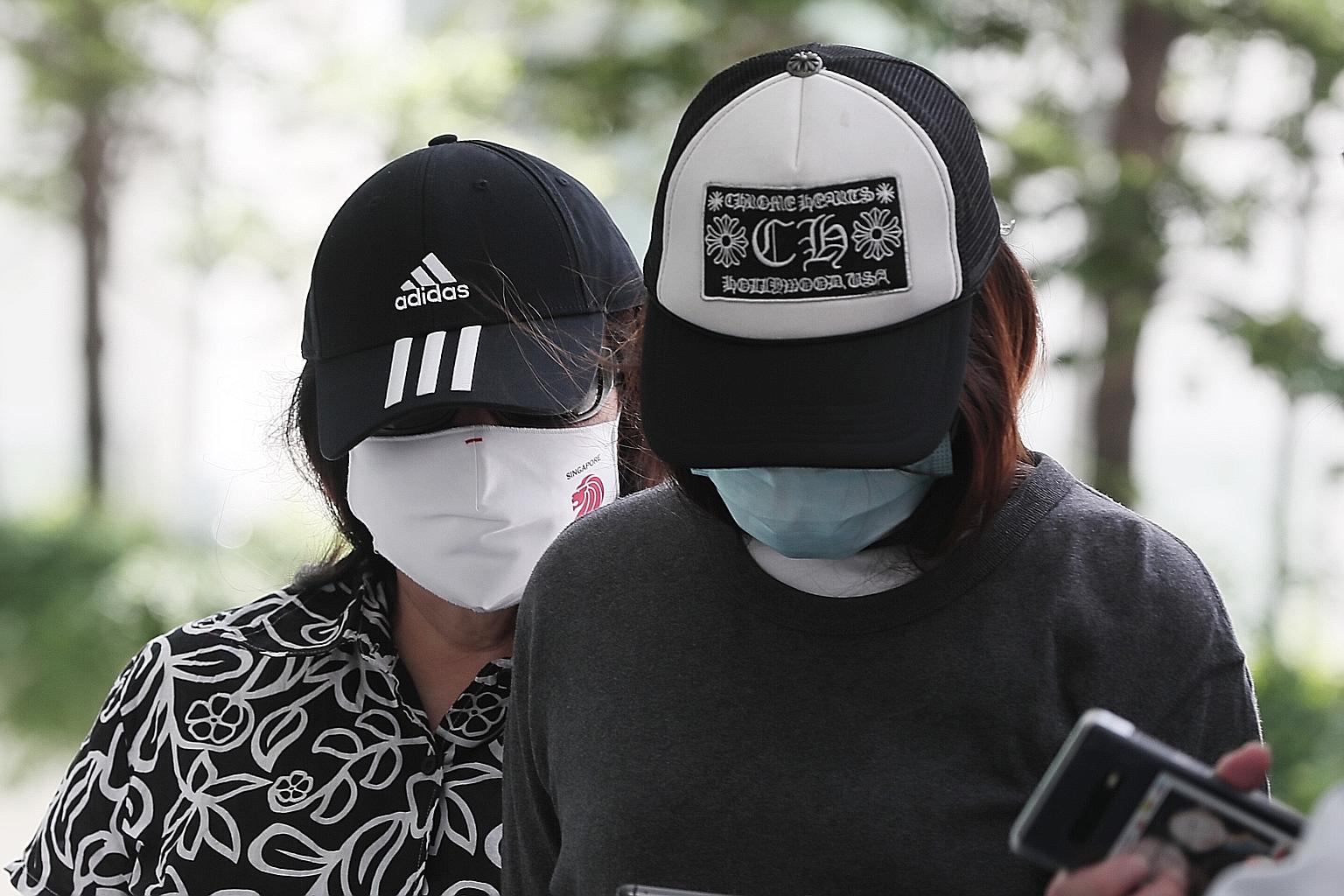 Lucy Teo (left) and Sharon Loo Wai Woon worked together to accept bribes from a woman seeking to be a Singapore permanent resident.