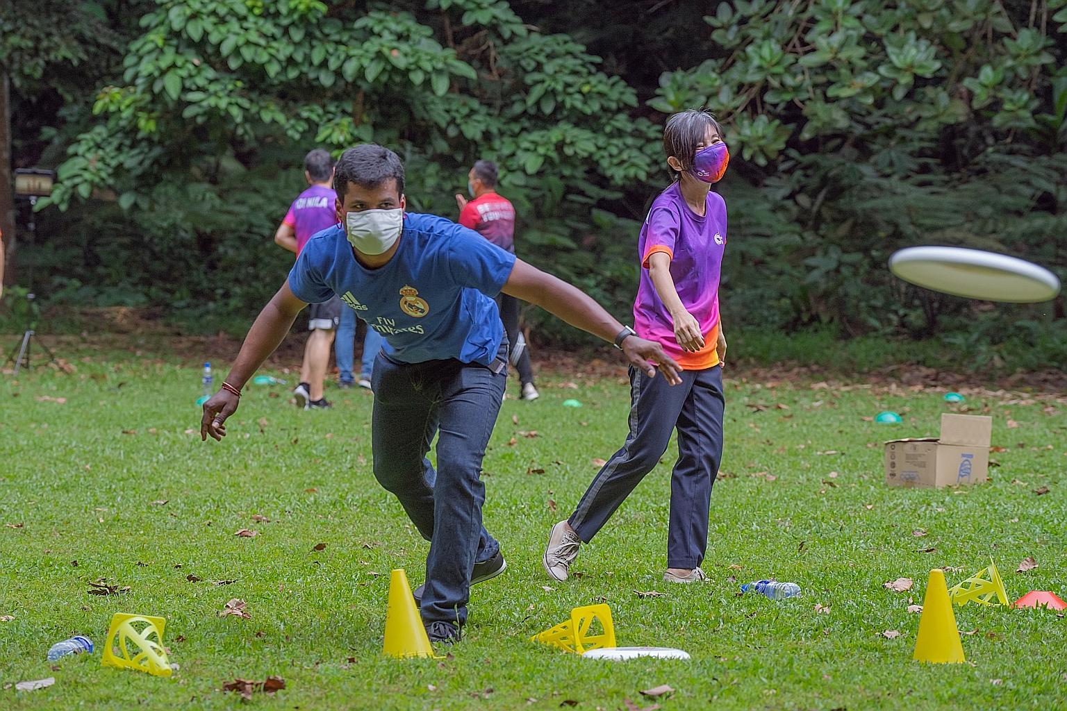 Migrant worker Rajagopal Purusothaman taking part in an activity at Bukit Batok Nature Park yesterday. The activities for a mixed group of 25 people, including nine migrant workers, were part of a pilot initiative by volunteer-run campaign Welcome In
