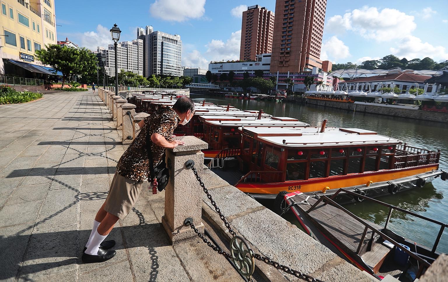 The Singapore Tourism Board is working with the People's Association to set up counters at community centres. Seniors can go to the counters, where ambassadors will help them make their redemptions and purchases. ST PHOTO: KELVIN CHNG