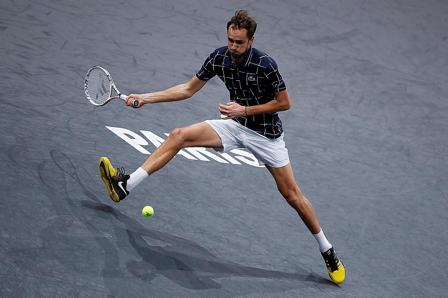 Daniil Medvedev returning the ball against Diego Schwartzman of Argentina yesterday in their Paris Masters quarter-final clash. The Russian won 6-3, 6-1.
