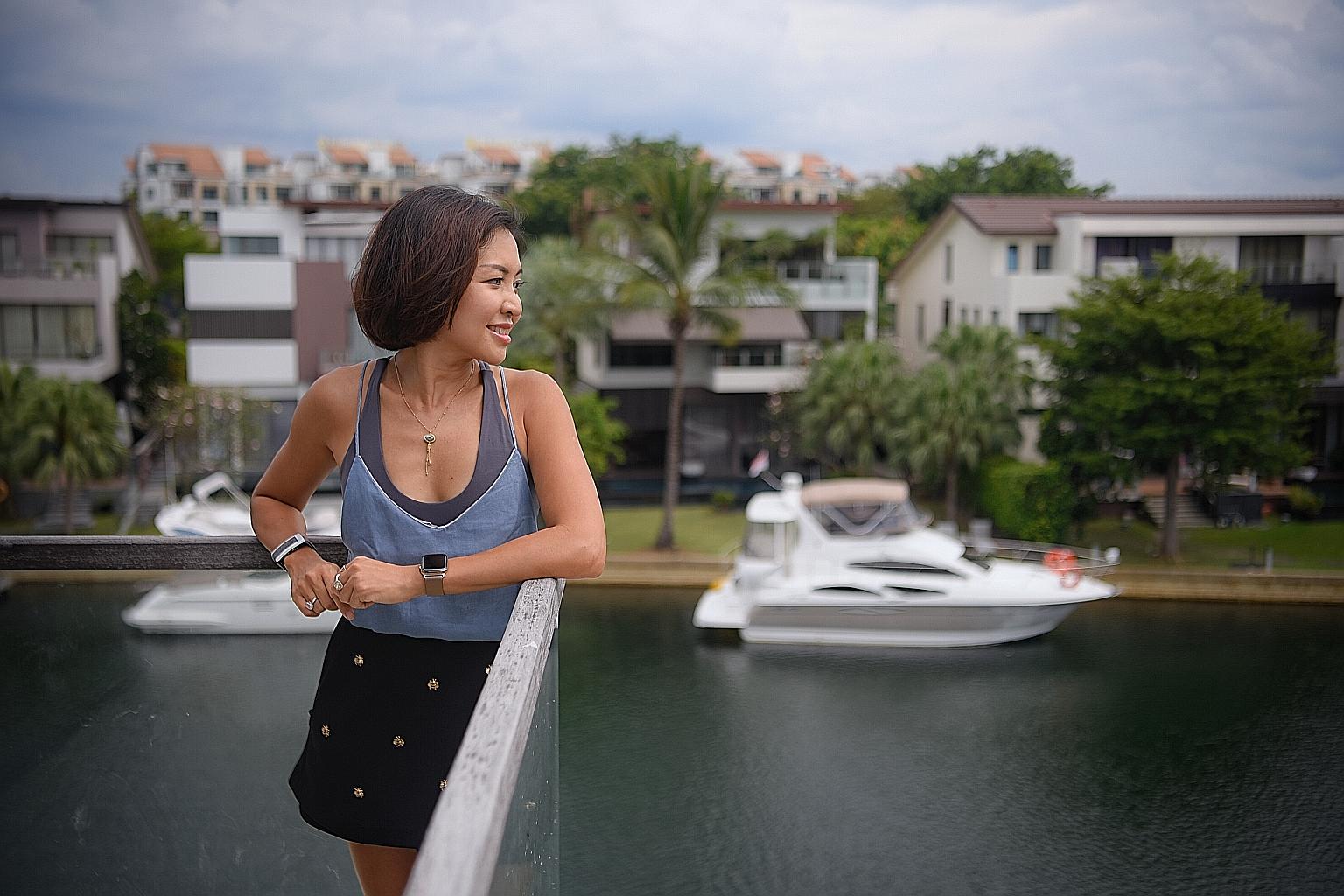 Ms Sandra Lim, seen on the balcony of a three-storey terraced house on Ocean Drive that she and her husband bought for $5.08 million, says she loves the lifestyle on Sentosa.