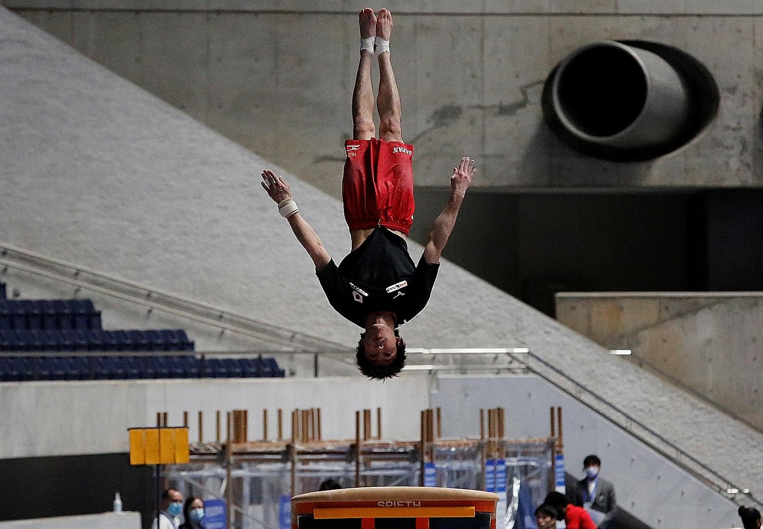 Japan's three-time Olympic gold medallist Kohei Uchimura practising for the friendly gymnastics competition in Tokyo yesterday. PHOTO: REUTERS