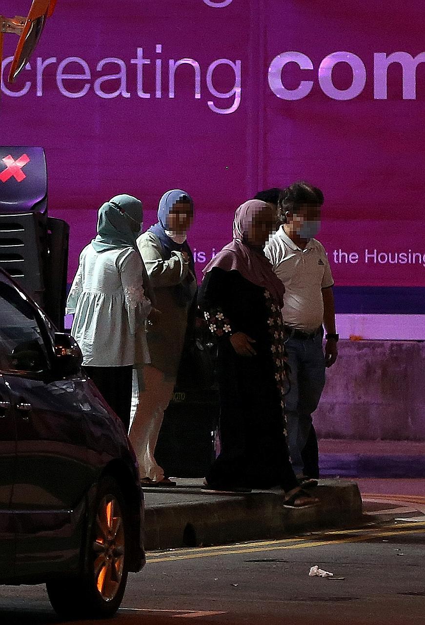 Each night, the five women still in the group leave the restaurant in a few cars, with the man taking a ride in one of the vehicles to his flat in the western part of Singapore.