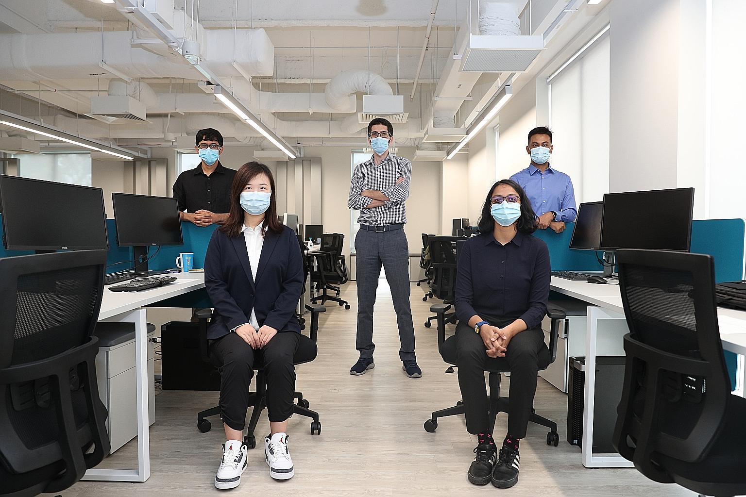 Assistant Professor Reza Shokri (standing in middle) with members of his NUS research team that developed the Machine Learning Privacy Meter, (from far left) master's student Mihir Khandekar, 24, doctoral student Chang Hongyan, 24, research assistant