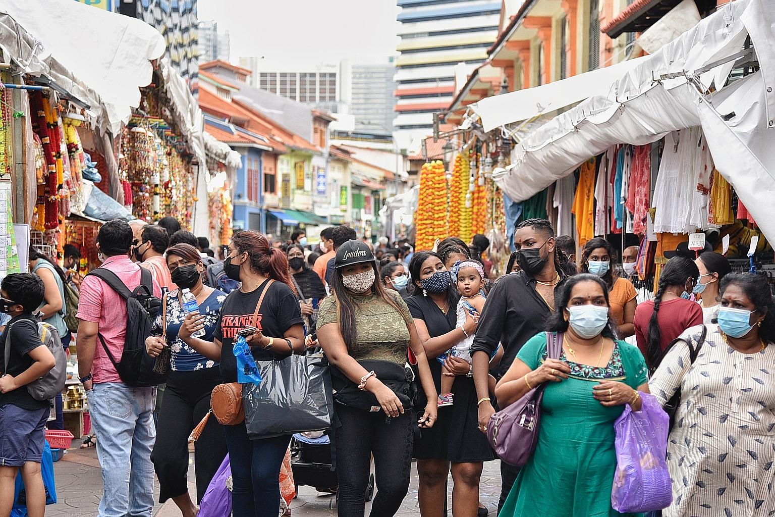 Shoppers in Campbell Lane on Nov 1. There have been smaller crowds in Little India compared with during the festive period in previous years, but business appeared brisk at various shops over the past two weekends.