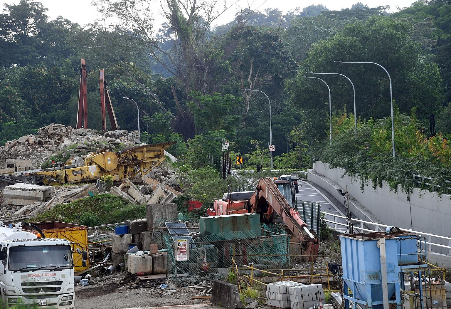 Construction equipment and debris left behind by recently delisted Swee Hong sit on a plot near Lorong Halwa.