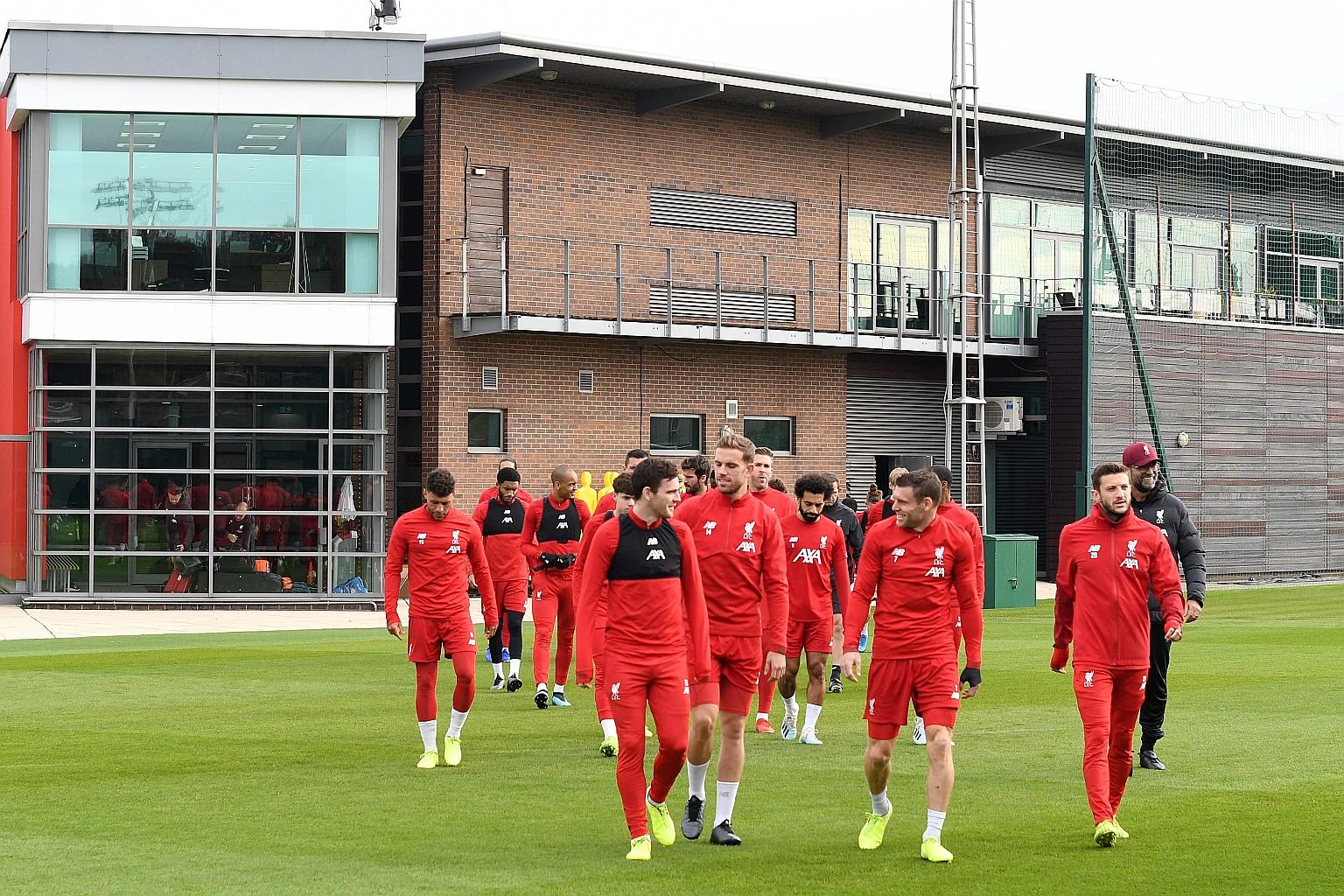 Liverpool players attending a training session last month at their Melwood training ground. The Reds will be moving into the new AXA Training Centre on the outskirts of Liverpool next week.