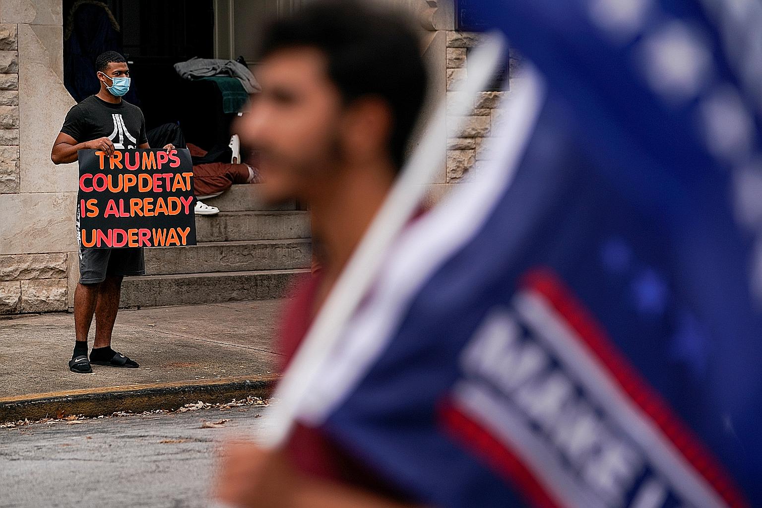 Supporters of United States President Donald Trump protesting against the election results outside the Georgia State Capitol in Atlanta, on Wednesday. Even though Mr Trump's claims are not on firm ground, the harm to public trust in the US constituti