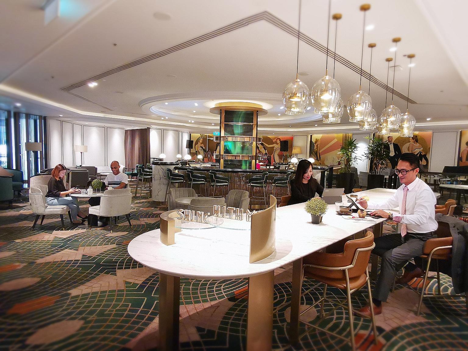 Orchard Hotel Singapore has retrofitted the sleek space in its Bar Intermezzo for co-working, adding black power plugs under marble coffee tables and bar counters.